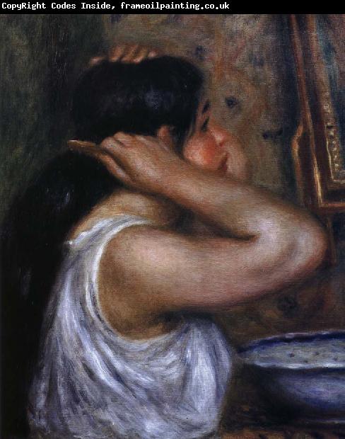 Pierre Auguste Renoir kvinna som kammar sig